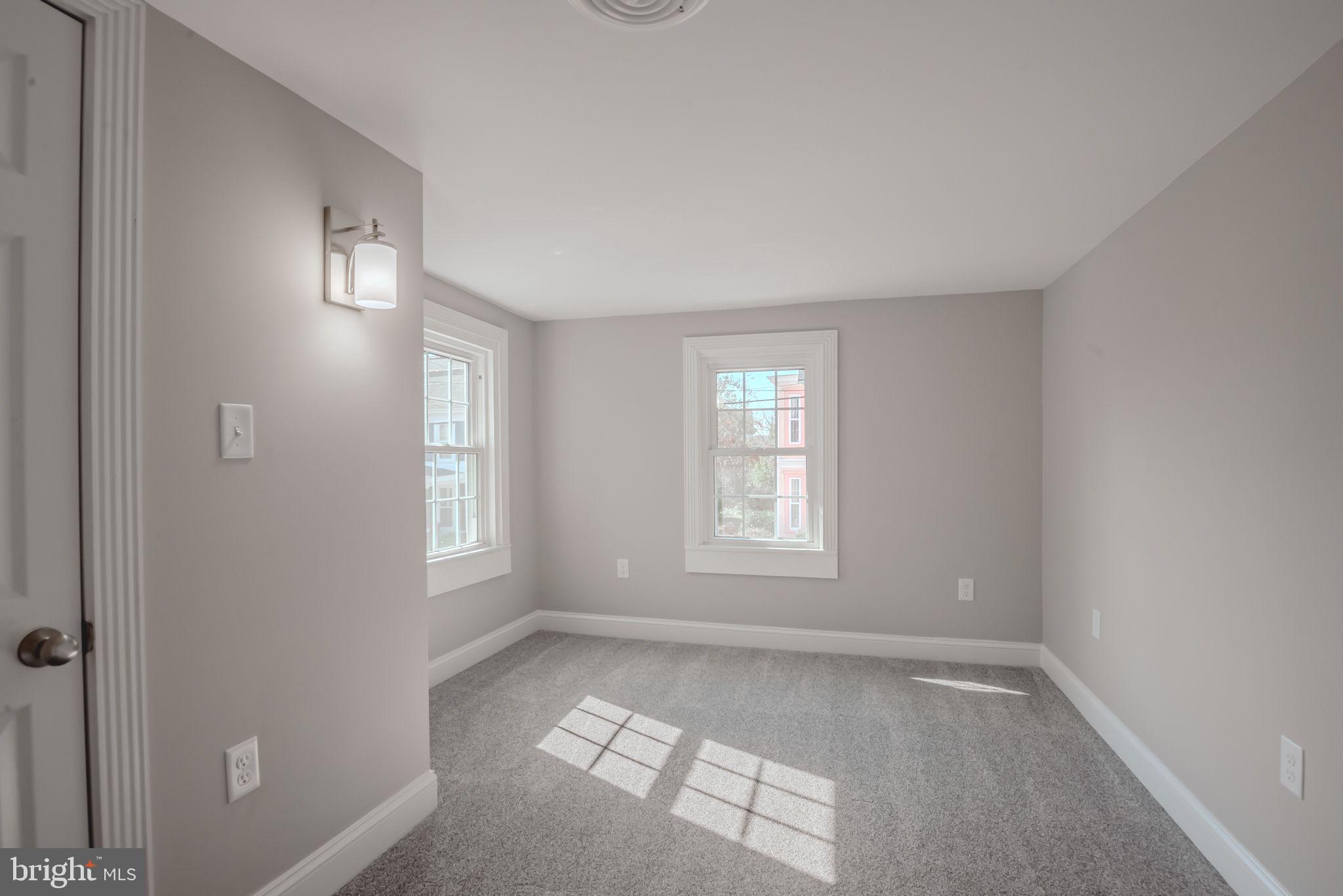 319 Union Street Milton, DE 19968 - Photo 46 of 61 a view of empty room with windows