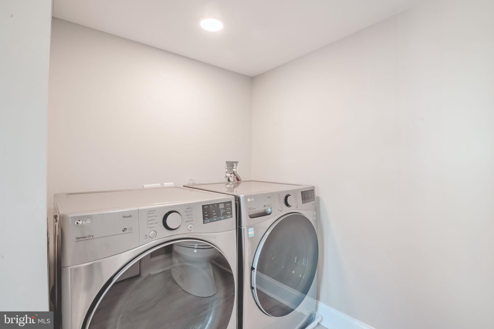 319 Union Street Milton, DE 19968 - Photo 49 of 61 a utility room with dryer and washer