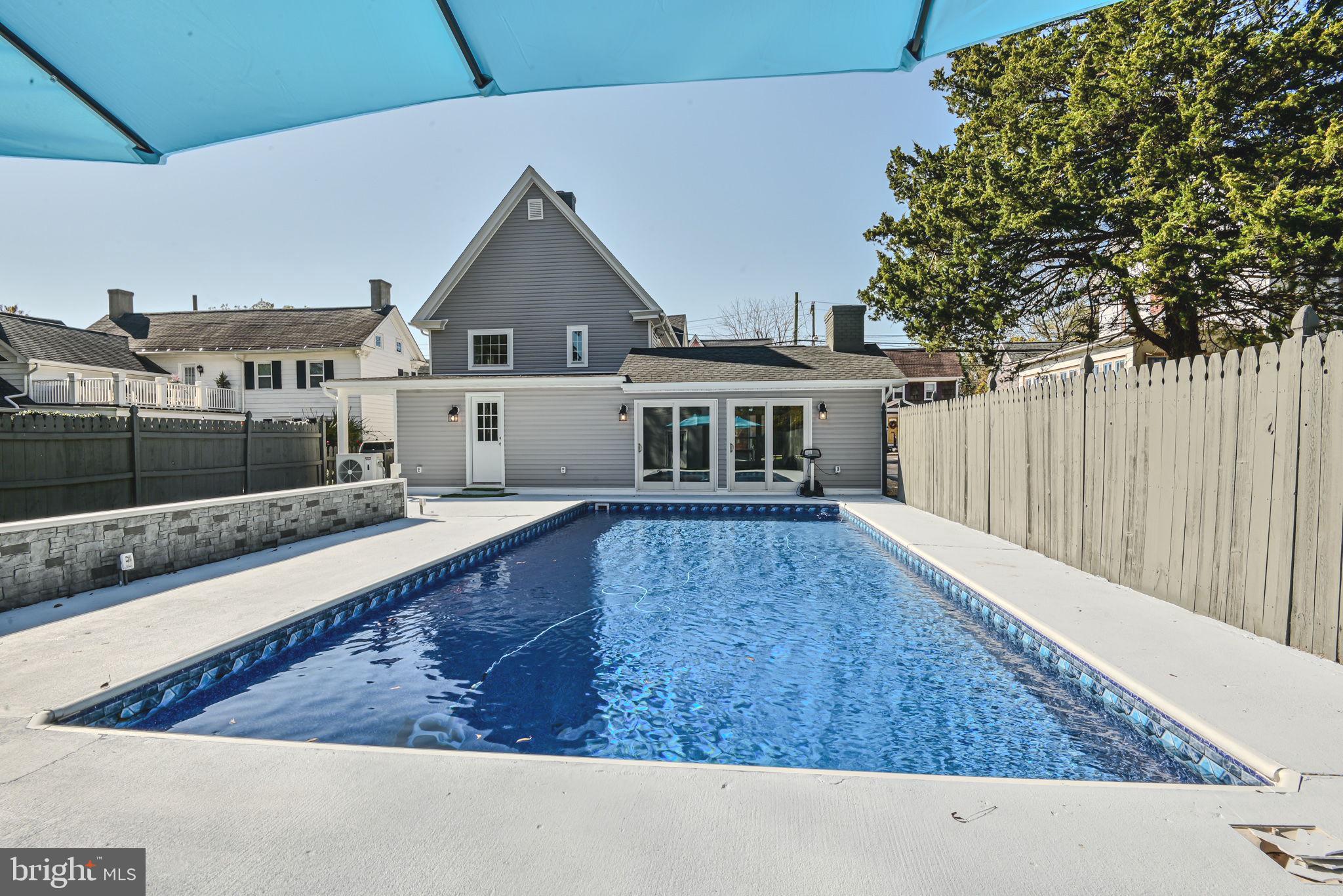 319 Union Street Milton, DE 19968 - Photo 5 of 61 a view of house with a yard