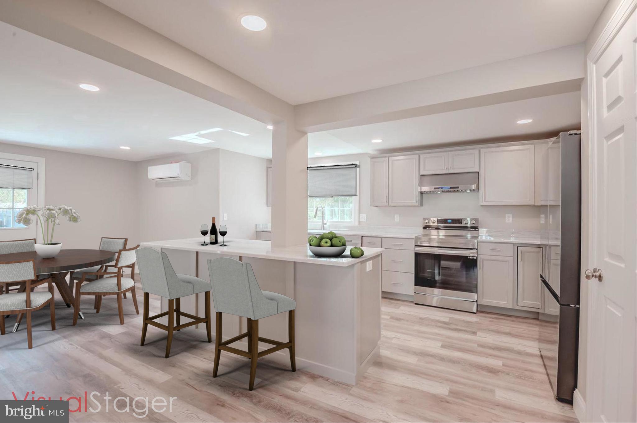 319 Union Street Milton, DE 19968 - Photo 7 of 61 a kitchen with stainless steel appliances a stove a sink a refrigerator white cabinets and dining table