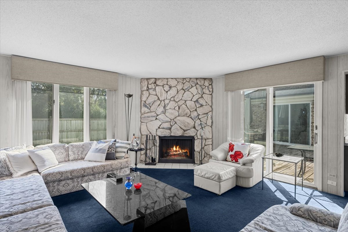 320 Buckthorn Circle Northbrook, IL 60062 - Photo 9 of 20 a living room with furniture and a fireplace