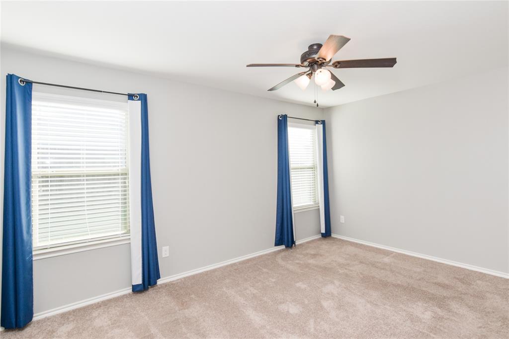 1406 Slate Street Princeton, TX 75407 - Photo 16 of 25 a view of an empty room with a window