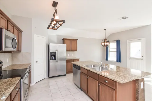 a bathroom with a sink a vanity and a mirror