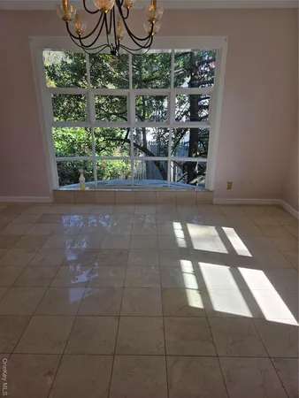 a view of a glass door with a outdoor space