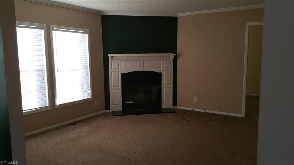 408 Eaton Road Mocksville, NC 27028 - Photo 7 of 11 2nd living room with wood burning fireplace