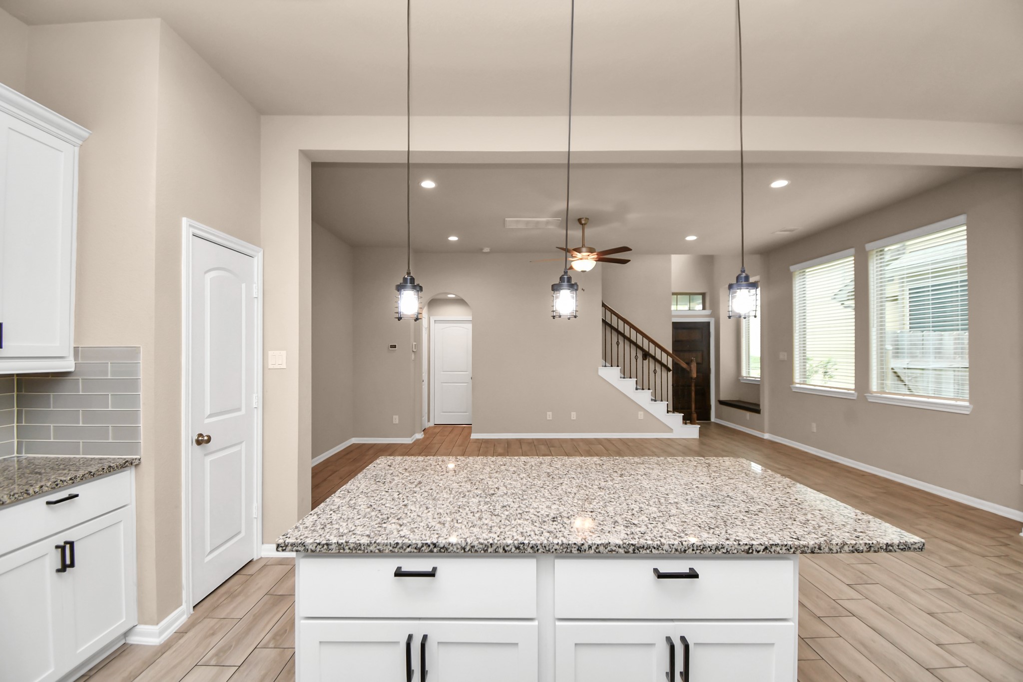 4220 Merry Mill Drive Spring, TX 77386 - Photo 13 of 44 a view of a kitchen with a granite countertop sink and refrigerator