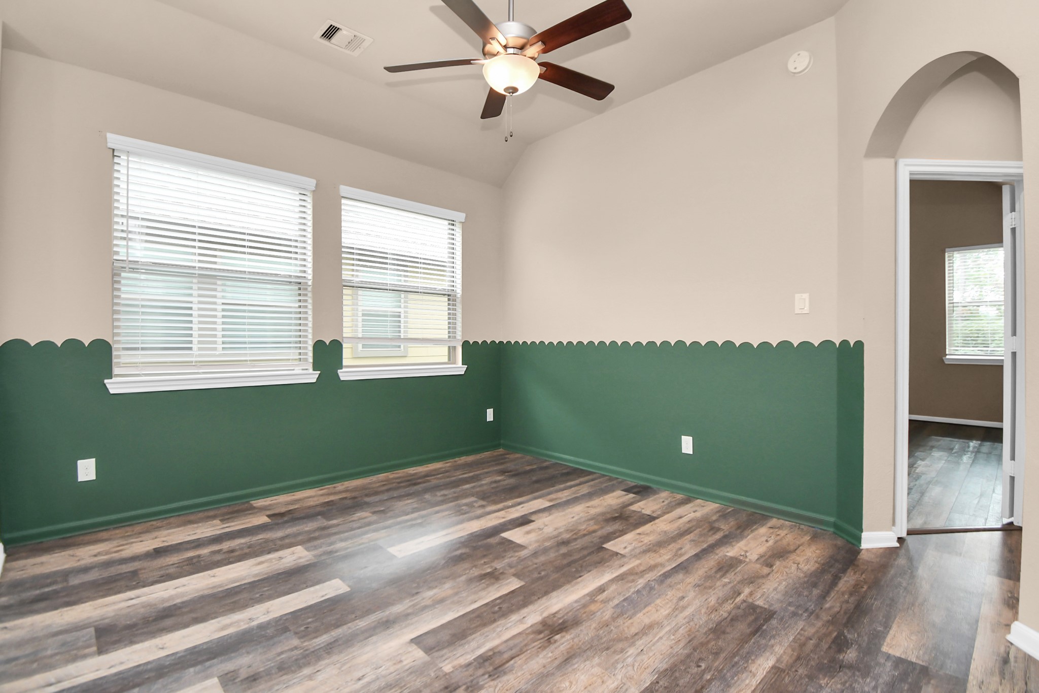 4220 Merry Mill Drive Spring, TX 77386 - Photo 20 of 44 a view of a livingroom with a fan and a window