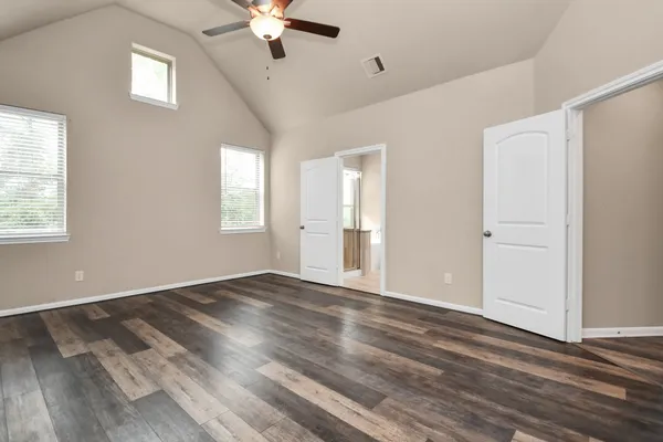 a view of a livingroom with wooden floor