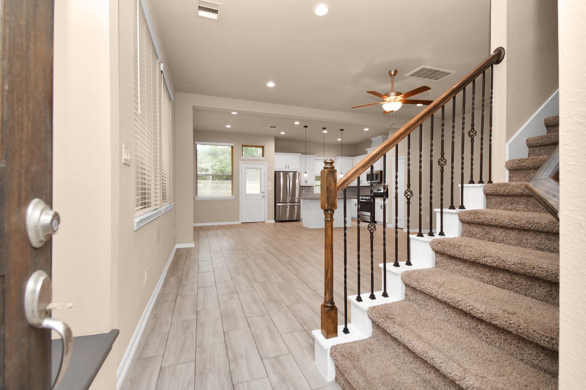 4220 Merry Mill Drive Spring, TX 77386 - Photo 3 of 44 a view of entryway and hall with wooden floor