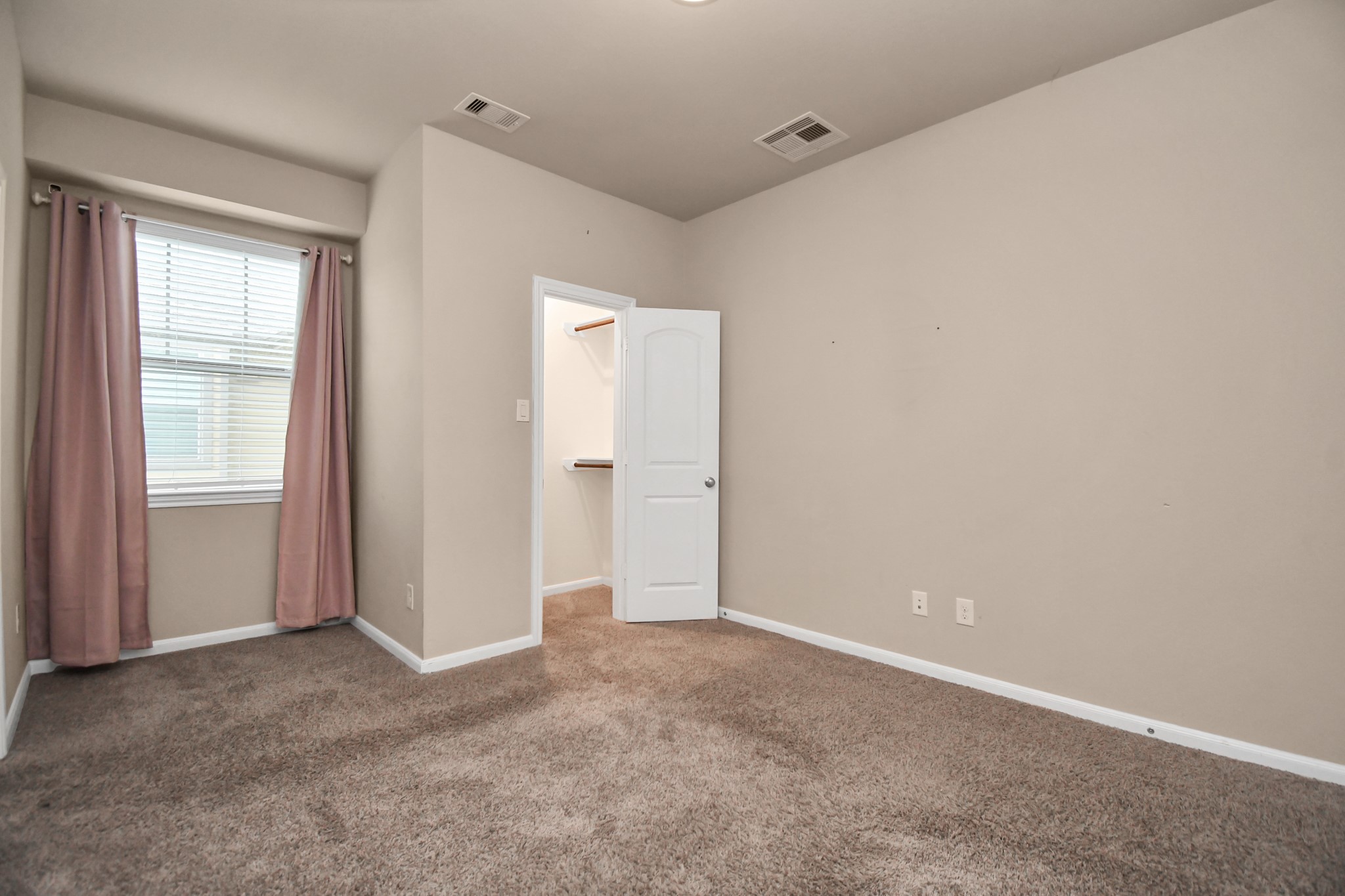 4220 Merry Mill Drive Spring, TX 77386 - Photo 31 of 44 a view of an empty room with a window