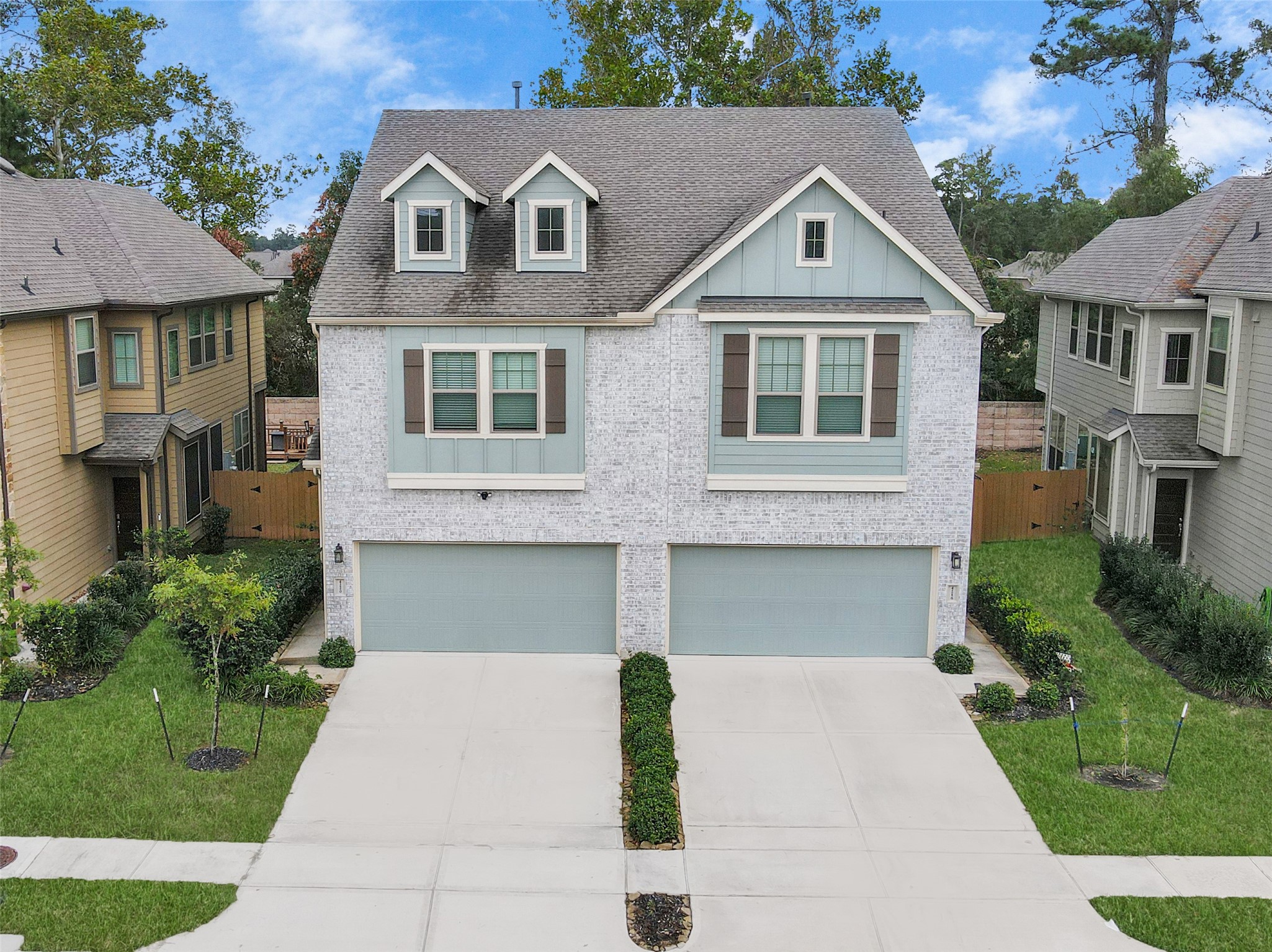 4220 Merry Mill Drive Spring, TX 77386 - Photo 43 of 44 a front view of a house with a yard and garage