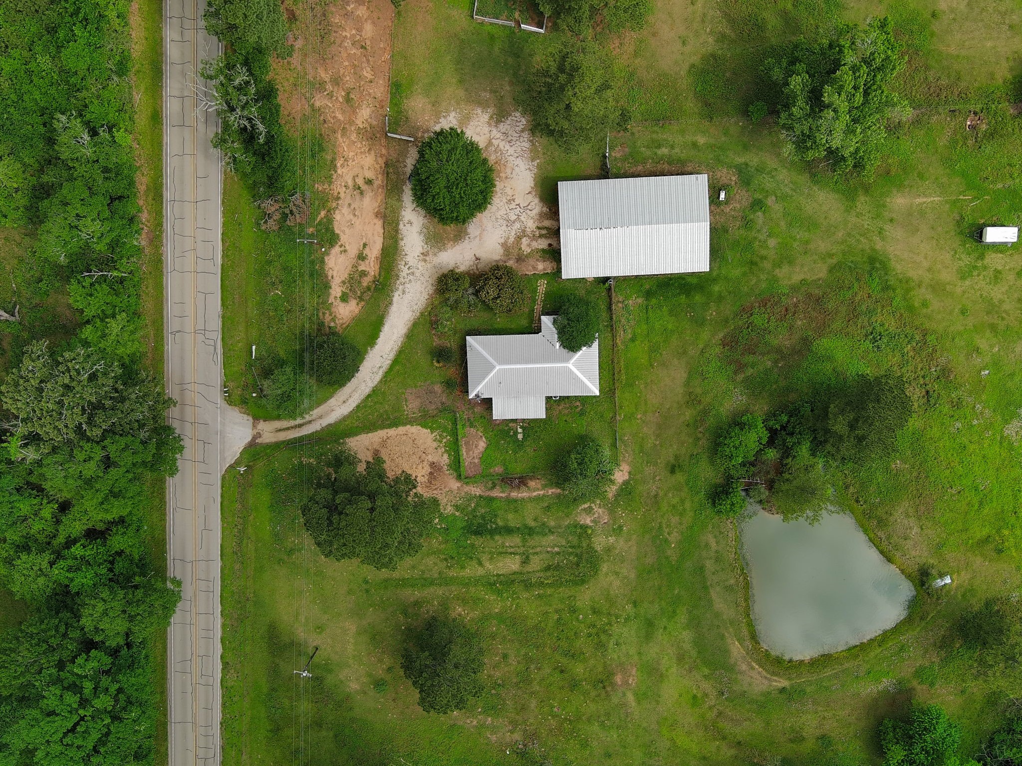 4027 Spring Branch Road Montgomery, TX 77316 - Photo 17 of 19 Country living with view of the lake and pasture.