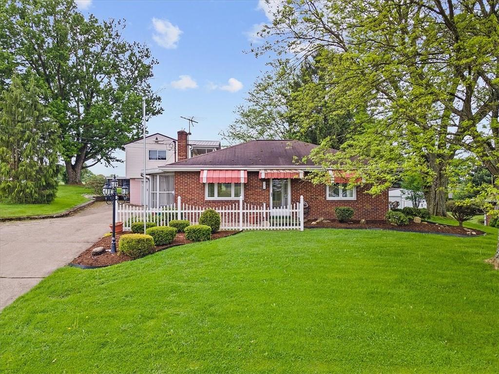 726 Winfield Road Cabot, PA 16023 - Photo 1 of 25 a view of a house with a big yard