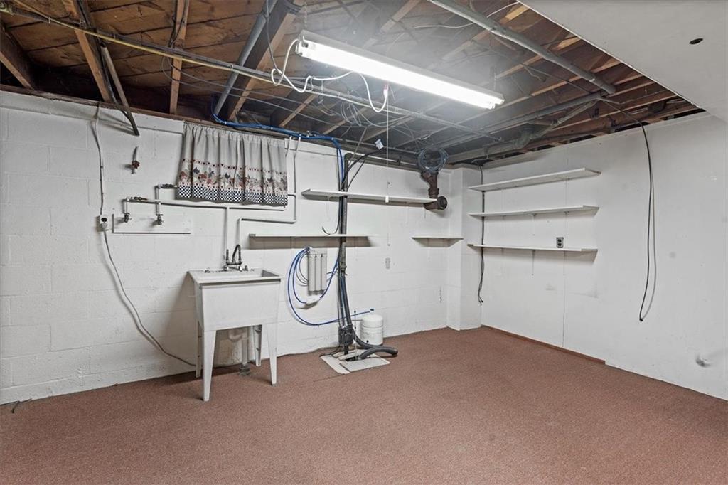 726 Winfield Road Cabot, PA 16023 - Photo 17 of 25 a view of a room with gym equipment