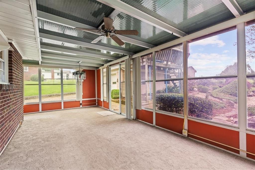 726 Winfield Road Cabot, PA 16023 - Photo 19 of 25 a view of an empty room with a balcony