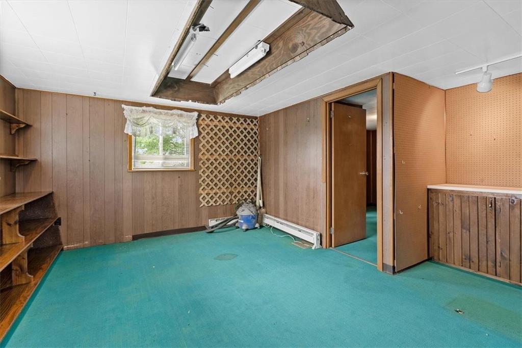 726 Winfield Road Cabot, PA 16023 - Photo 25 of 25 a view of an empty room with wooden floor and a window