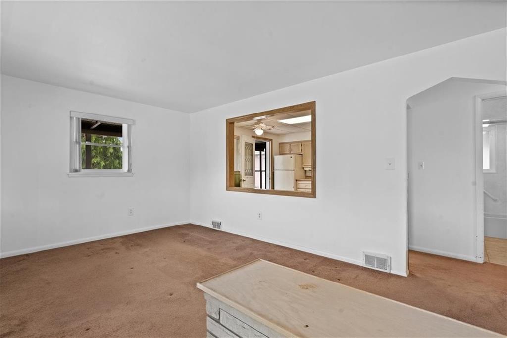 726 Winfield Road Cabot, PA 16023 - Photo 3 of 25 a room with a bed and a window
