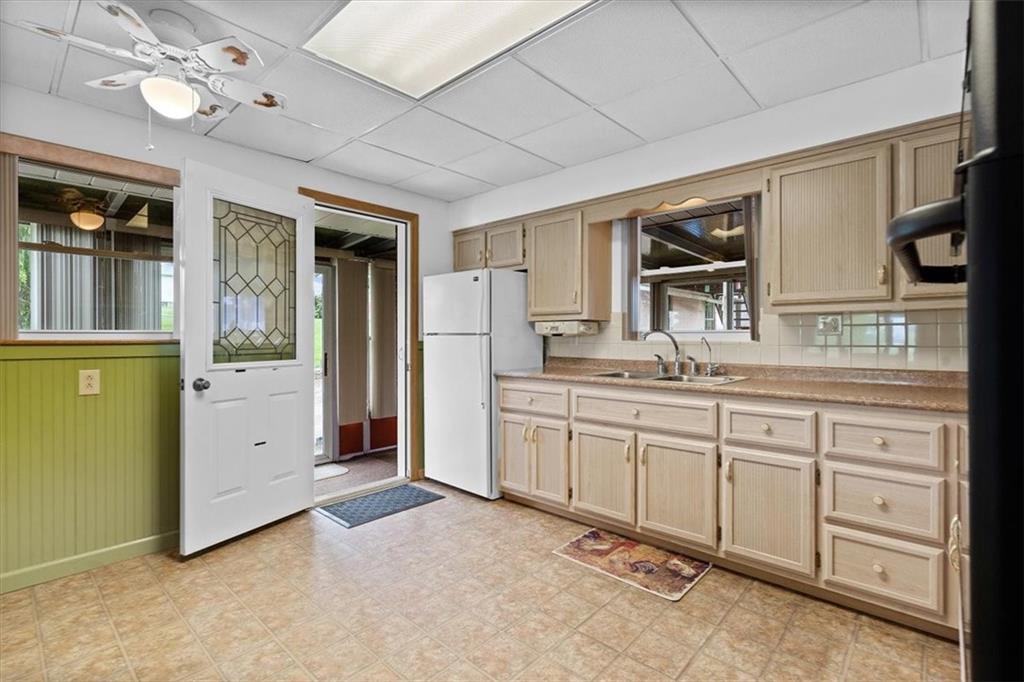 726 Winfield Road Cabot, PA 16023 - Photo 6 of 25 a spacious bathroom with a granite countertop sink and a mirror