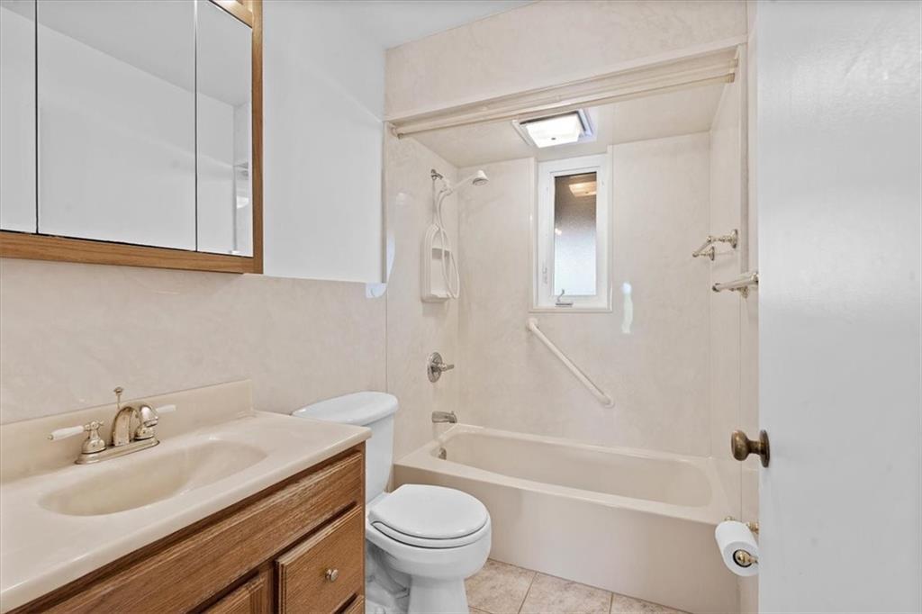 726 Winfield Road Cabot, PA 16023 - Photo 9 of 25 a bathroom with a sink a toilet and shower