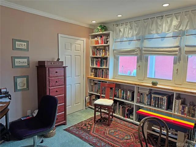 a bedroom with a bed and furniture