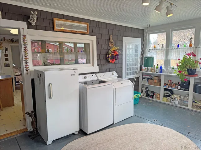 a view of livingroom with washer and dryer
