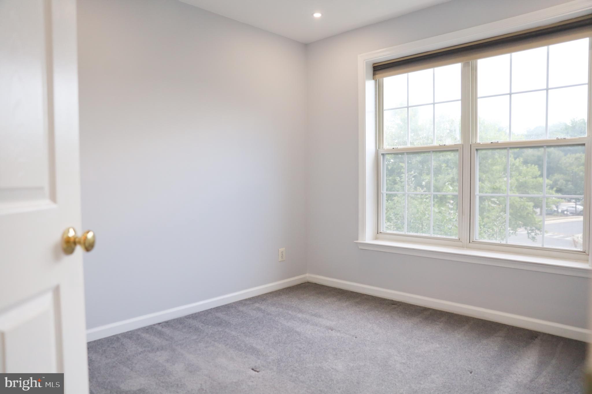 6324 Locust Tree Lane Alexandria, VA 22312 - Photo 14 of 21 an empty room with a window