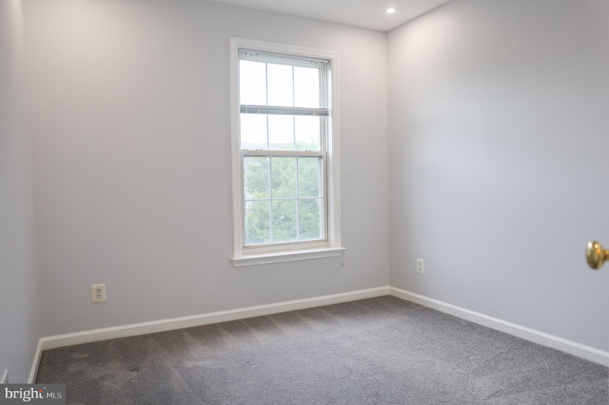 6324 Locust Tree Lane Alexandria, VA 22312 - Photo 15 of 21 an empty room with a window