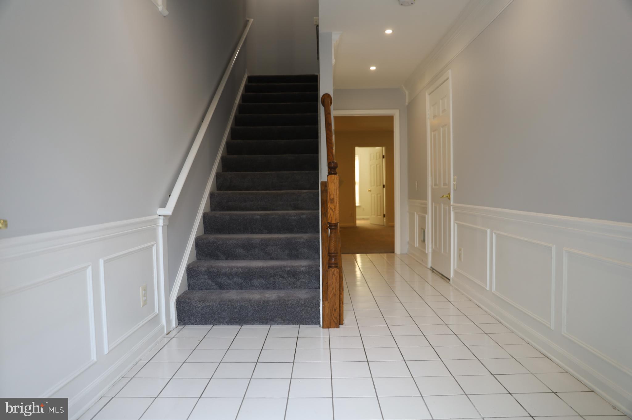 6324 Locust Tree Lane Alexandria, VA 22312 - Photo 16 of 21 a view of entryway and hall with wooden floor
