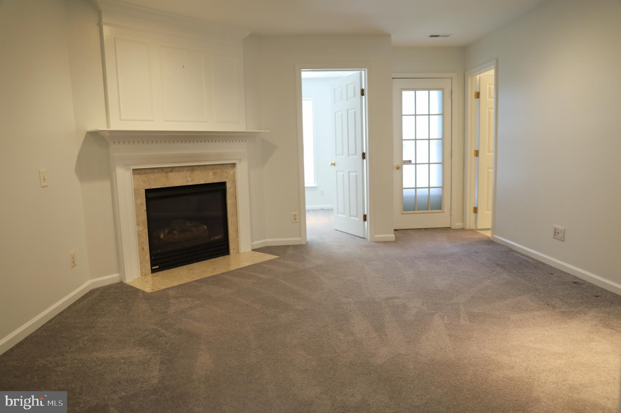 6324 Locust Tree Lane Alexandria, VA 22312 - Photo 17 of 21 an empty room with windows
