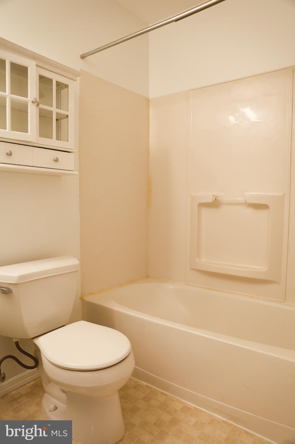 6324 Locust Tree Lane Alexandria, VA 22312 - Photo 20 of 21 a bathroom with a toilet and a shower