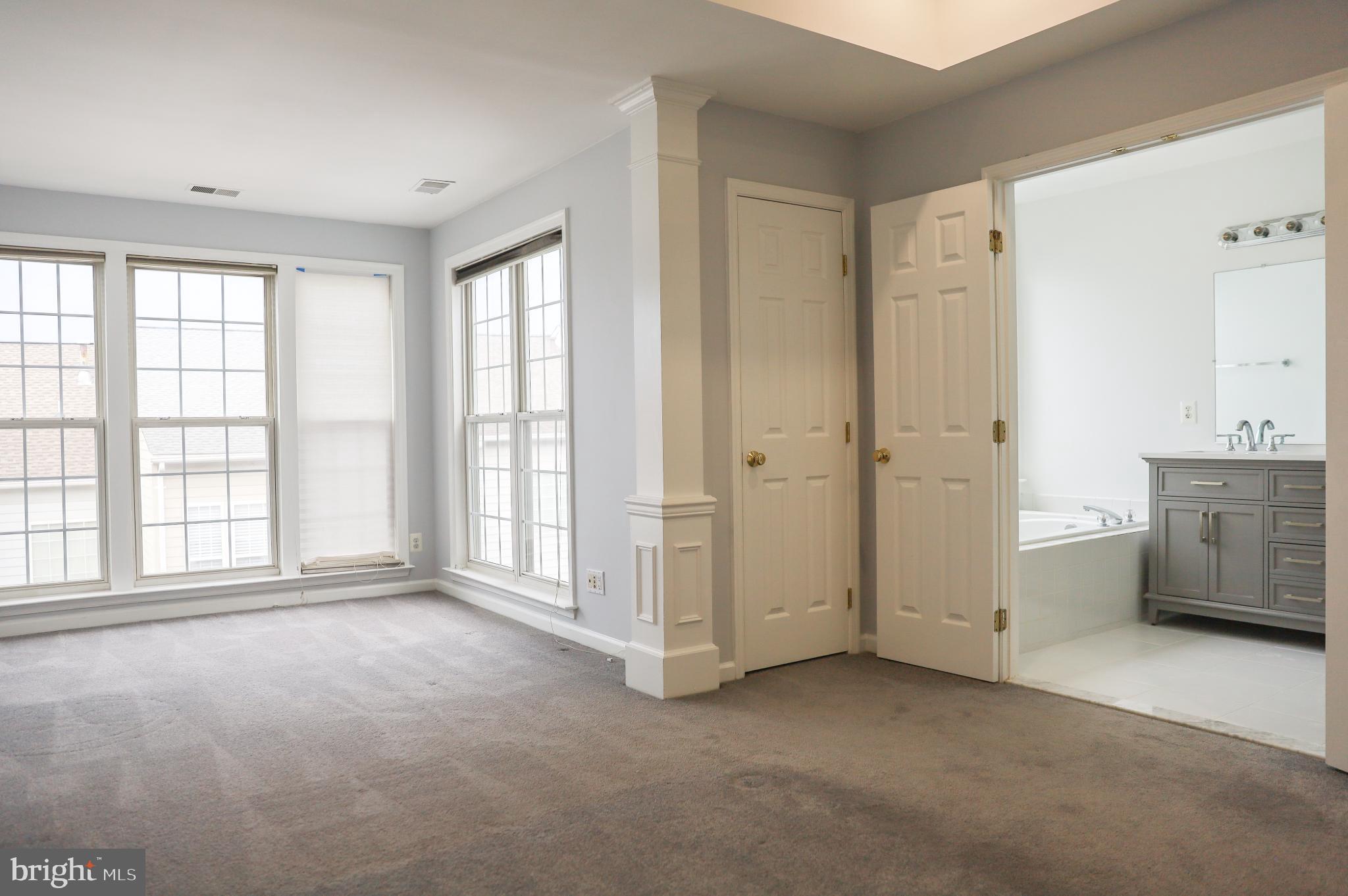 6324 Locust Tree Lane Alexandria, VA 22312 - Photo 10 of 21 a view of an empty room with a window