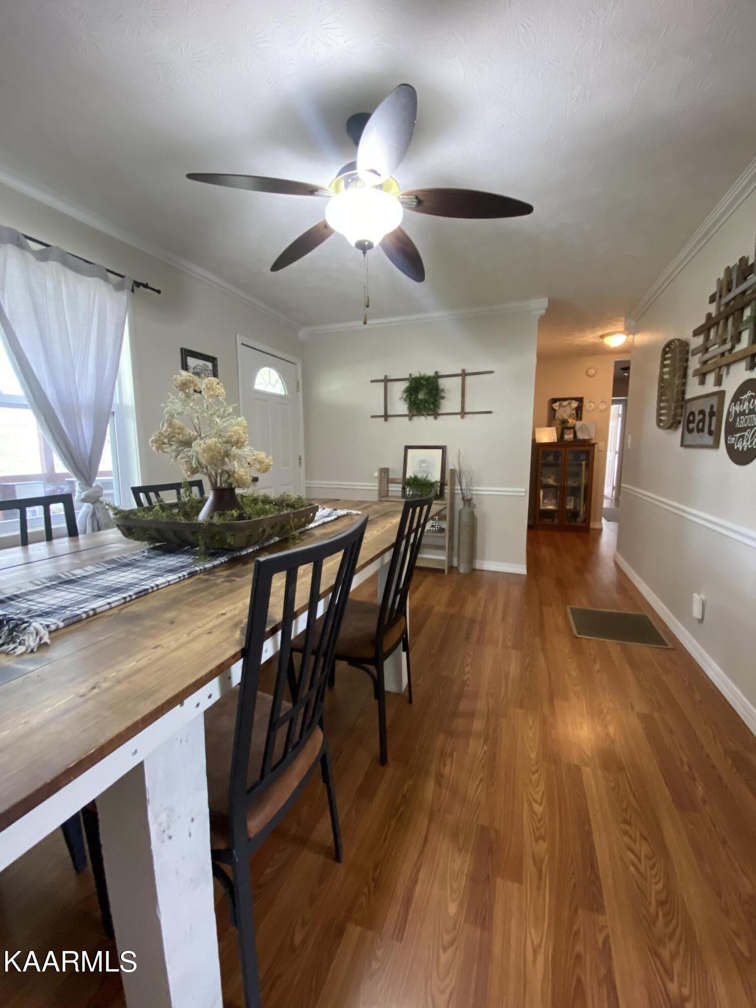 363 Ramsey Road Winfield, TN 37892 - Photo 9 of 54 a view of a dining room with furniture and wooden floor