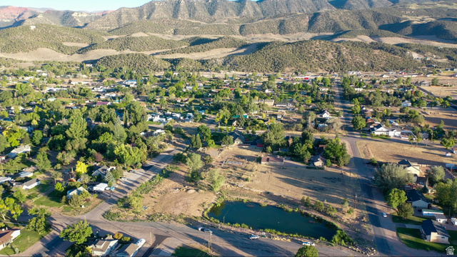 426 West Center Street Parowan, UT 84761 - Photo 103 of 107 Expansive aerial panorama showcasing a residential landscape set against a mountainous backdrop