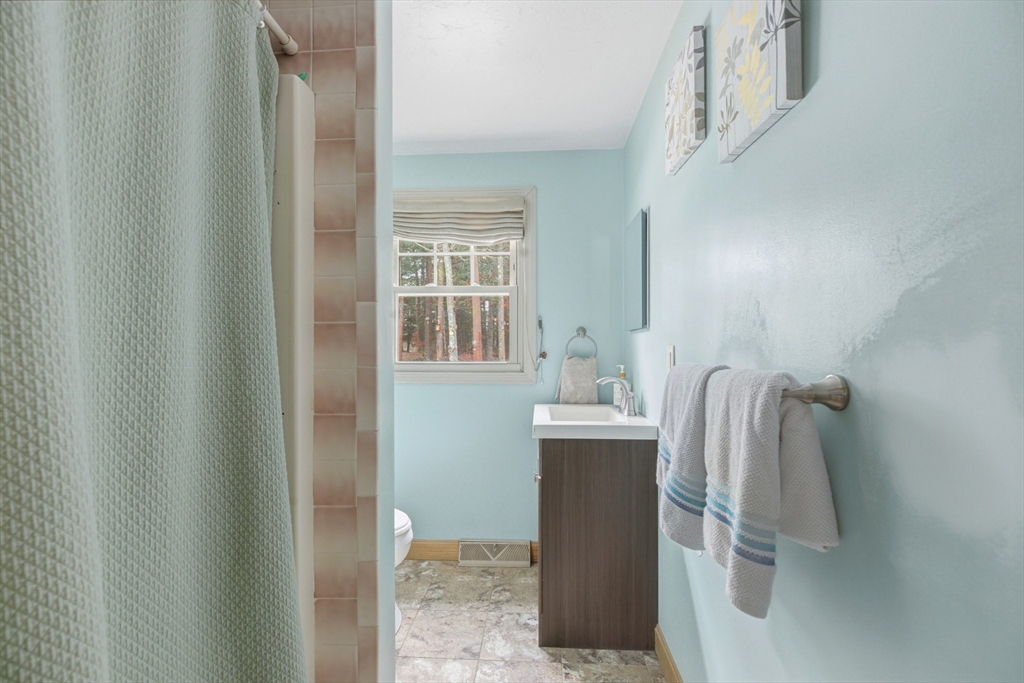 10 Wapping Road Kingston, MA 02364 - Photo 6 of 21 a bathroom with a sink and mirror