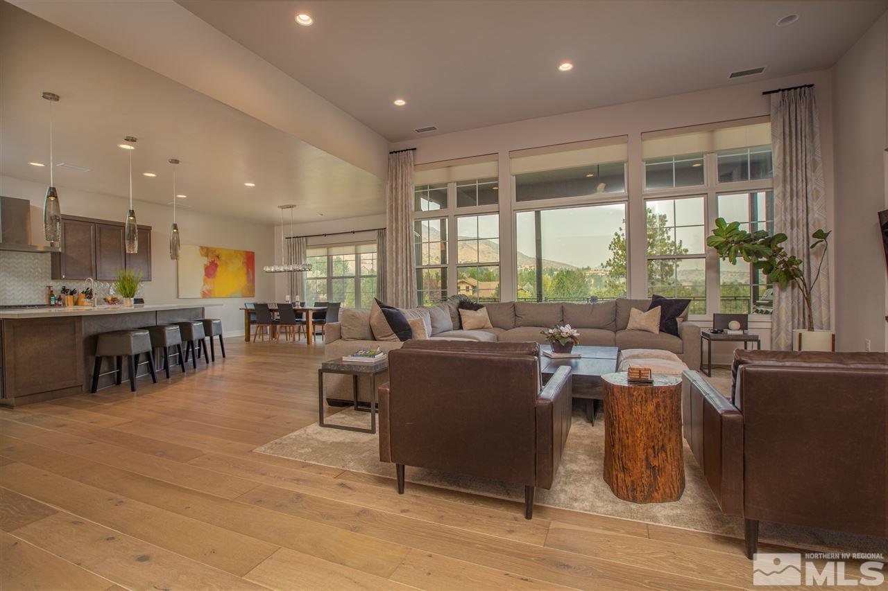 4105 Whispering Pine Loop Reno, NV 89519 - Photo 4 of 35 a living room with lots of furniture and kitchen view