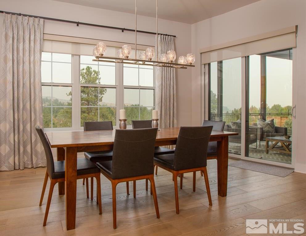 4105 Whispering Pine Loop Reno, NV 89519 - Photo 9 of 35 a view of a dining room with furniture window and outside view