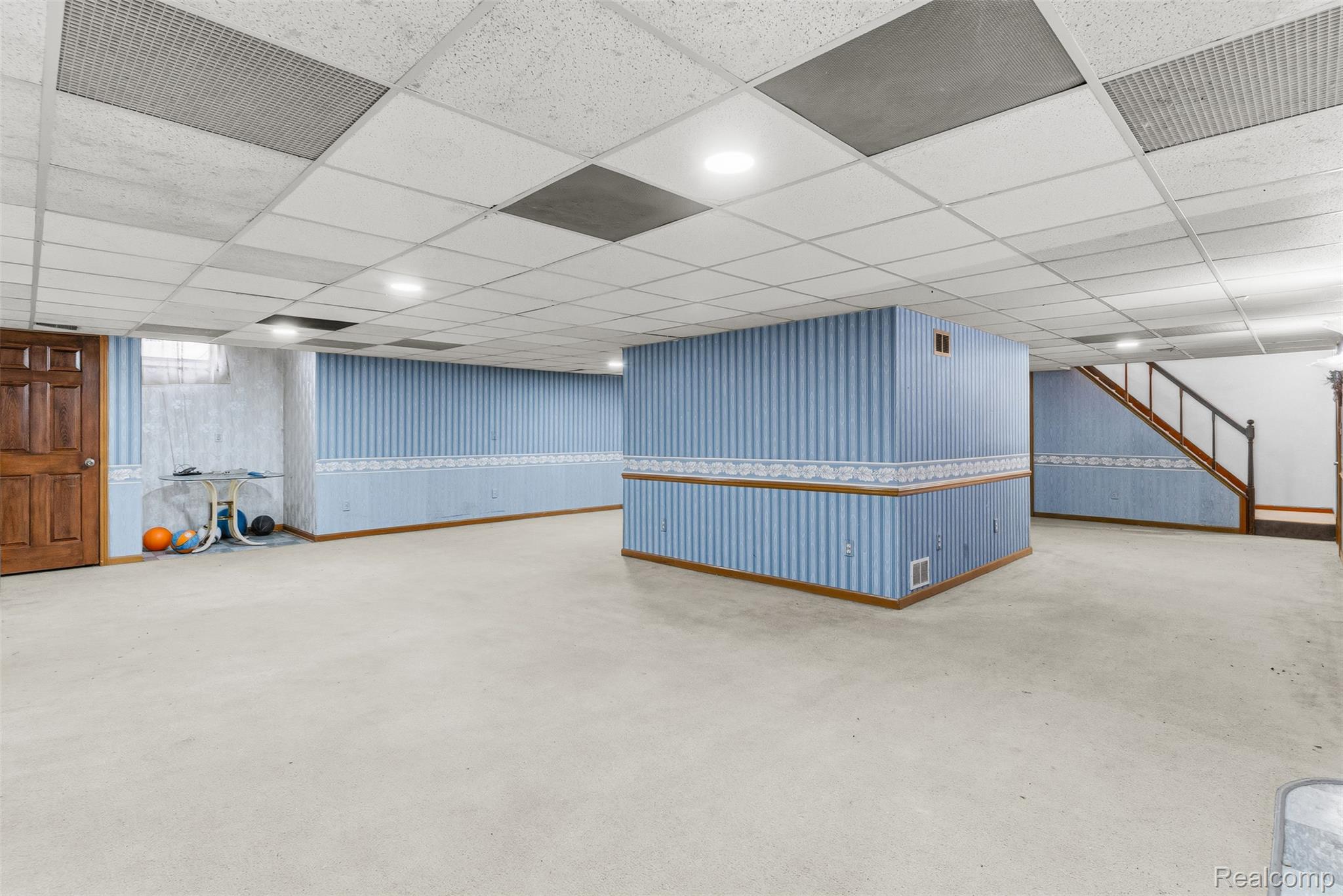 3432 South State Road Davison, MI 48423 - Photo 37 of 58 Finished basement featuring a drop ceiling and stairway