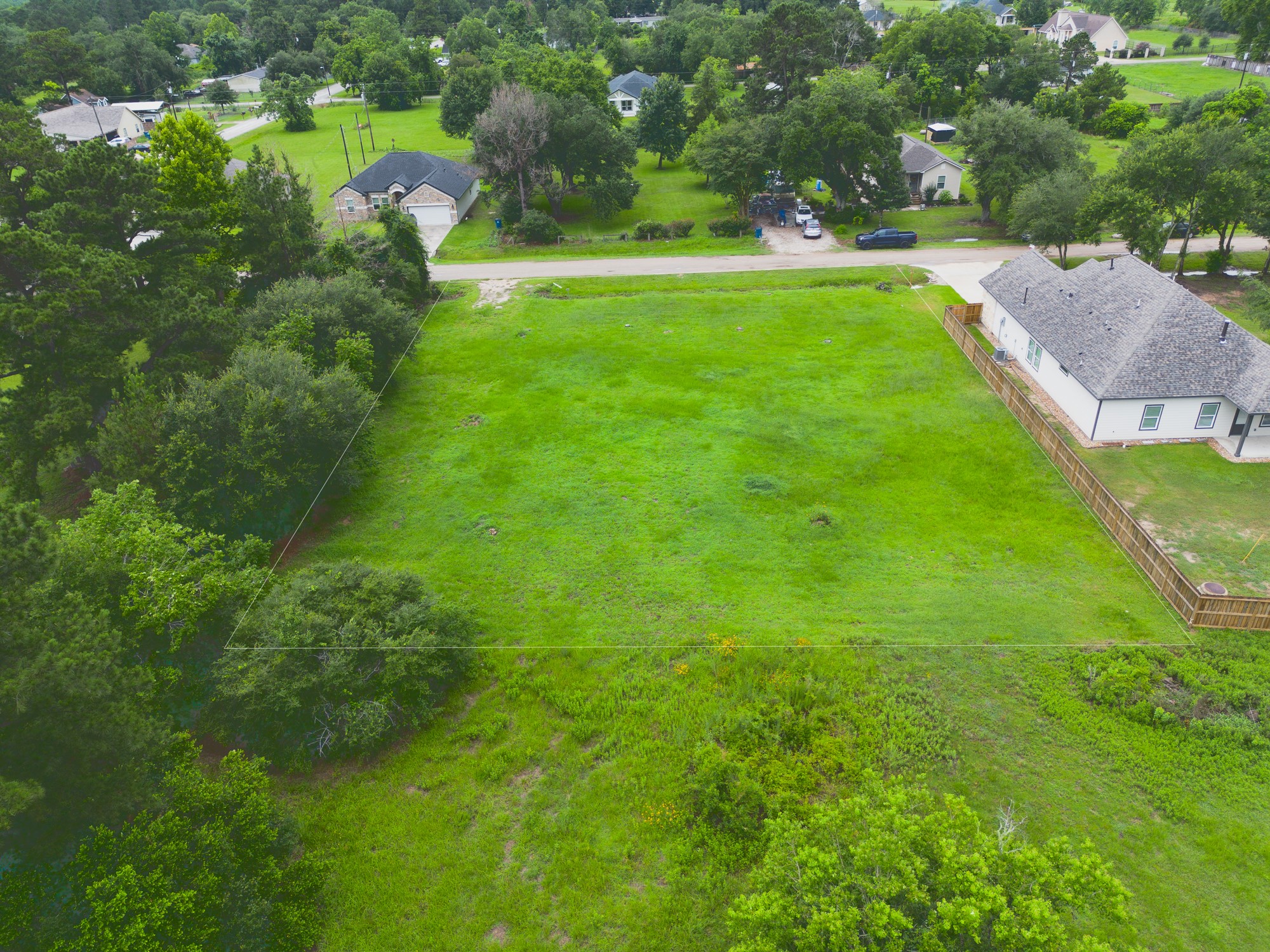626 Lily Street Prairie View, TX 77484 - Photo 2 of 5 a view of a garden with a lake