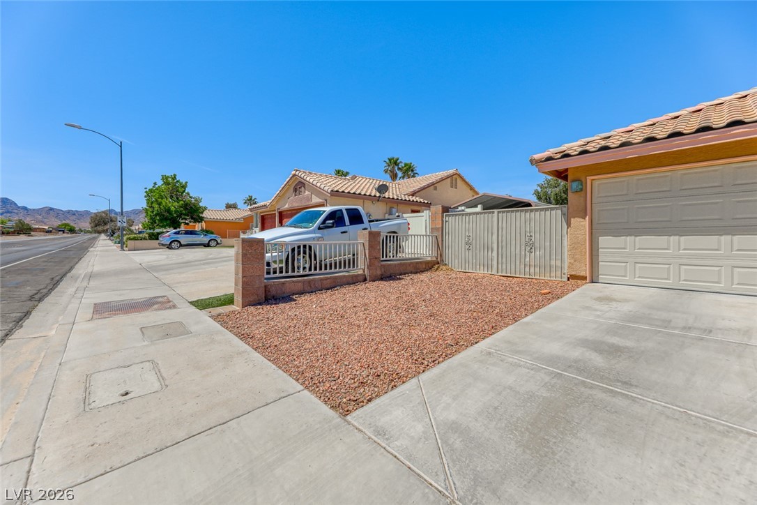 2001 Appaloosa Road Henderson, NV 89002 - Photo 44 of 44 This charming residence features a classic garage and convenient concrete driveway.