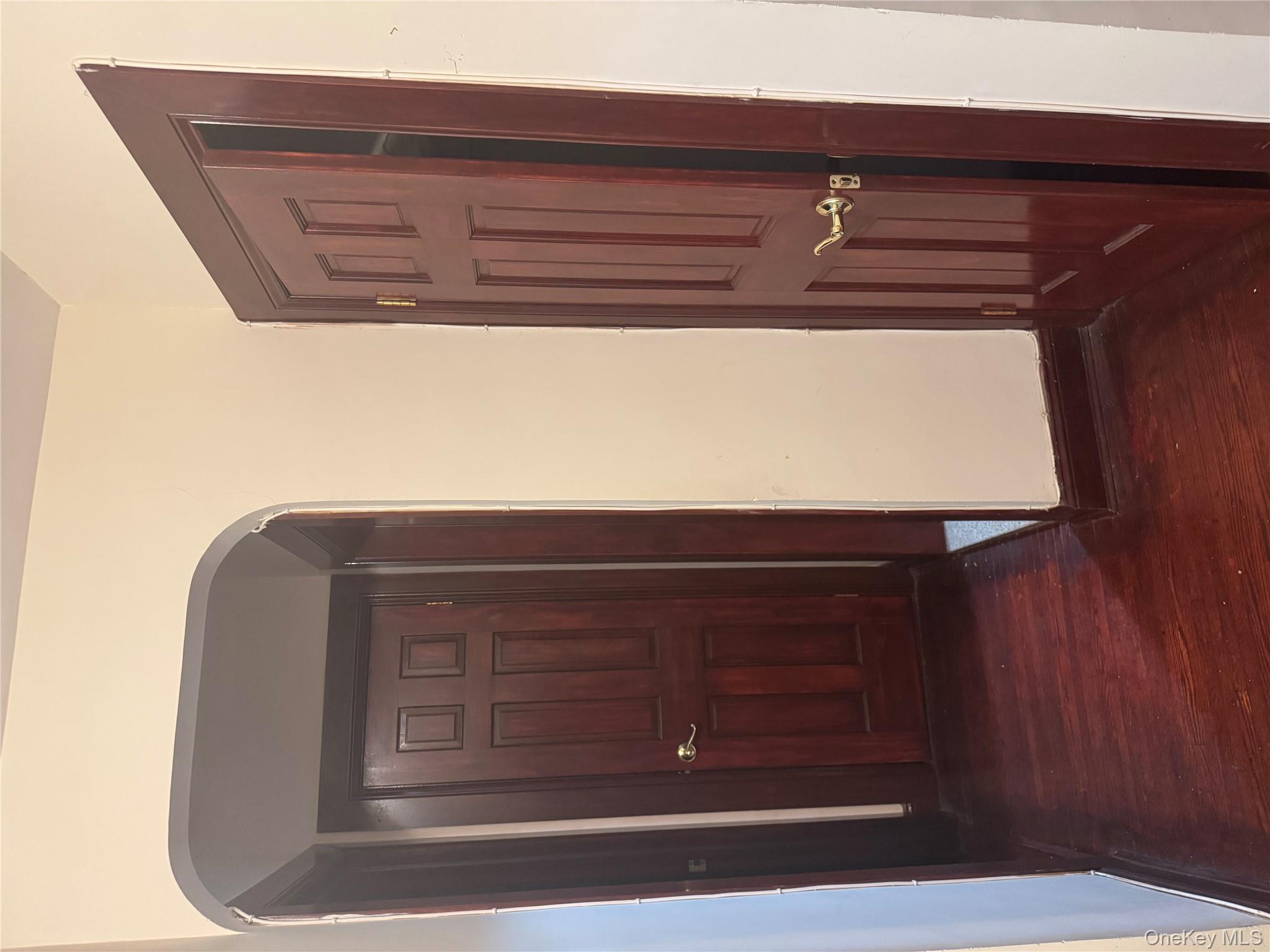 80-09 35th Avenue, Unit A12 Queens, NY 11372 - Photo 19 of 22 an entryway door with wooden floor