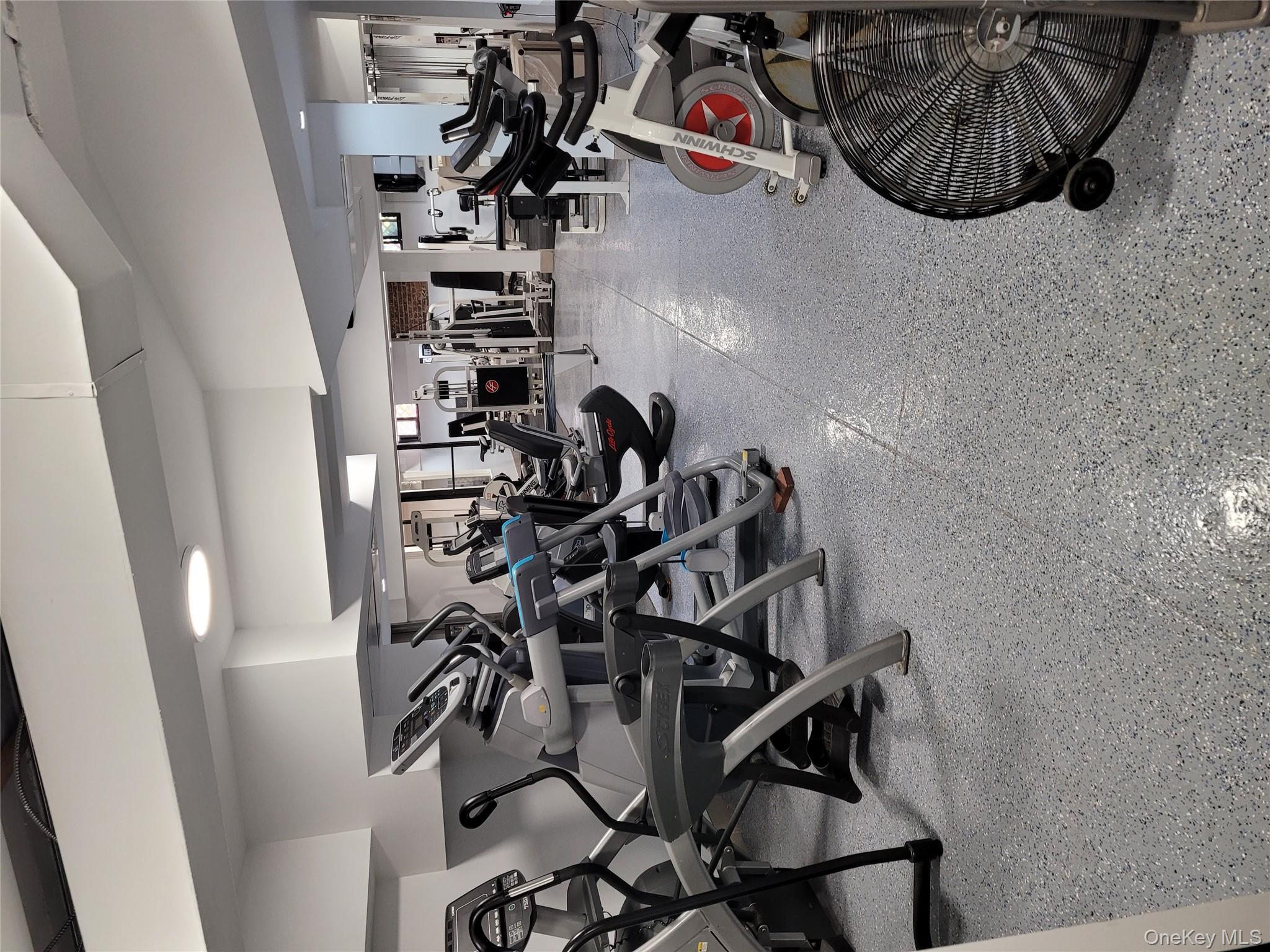 80-09 35th Avenue, Unit A12 Queens, NY 11372 - Photo 3 of 22 a view of a room with gym equipment