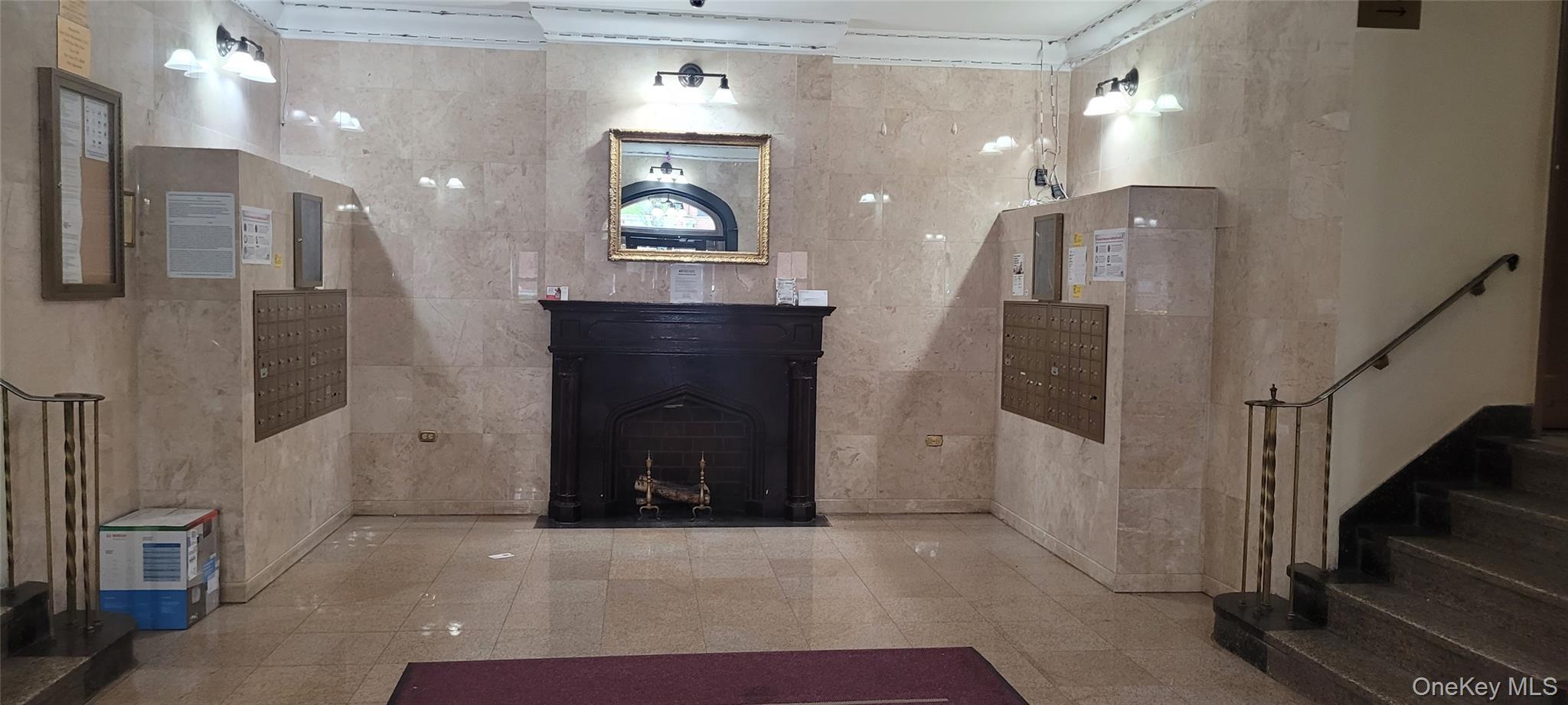 80-09 35th Avenue, Unit A12 Queens, NY 11372 - Photo 7 of 22 a view of a hallway with wooden floor and staircase