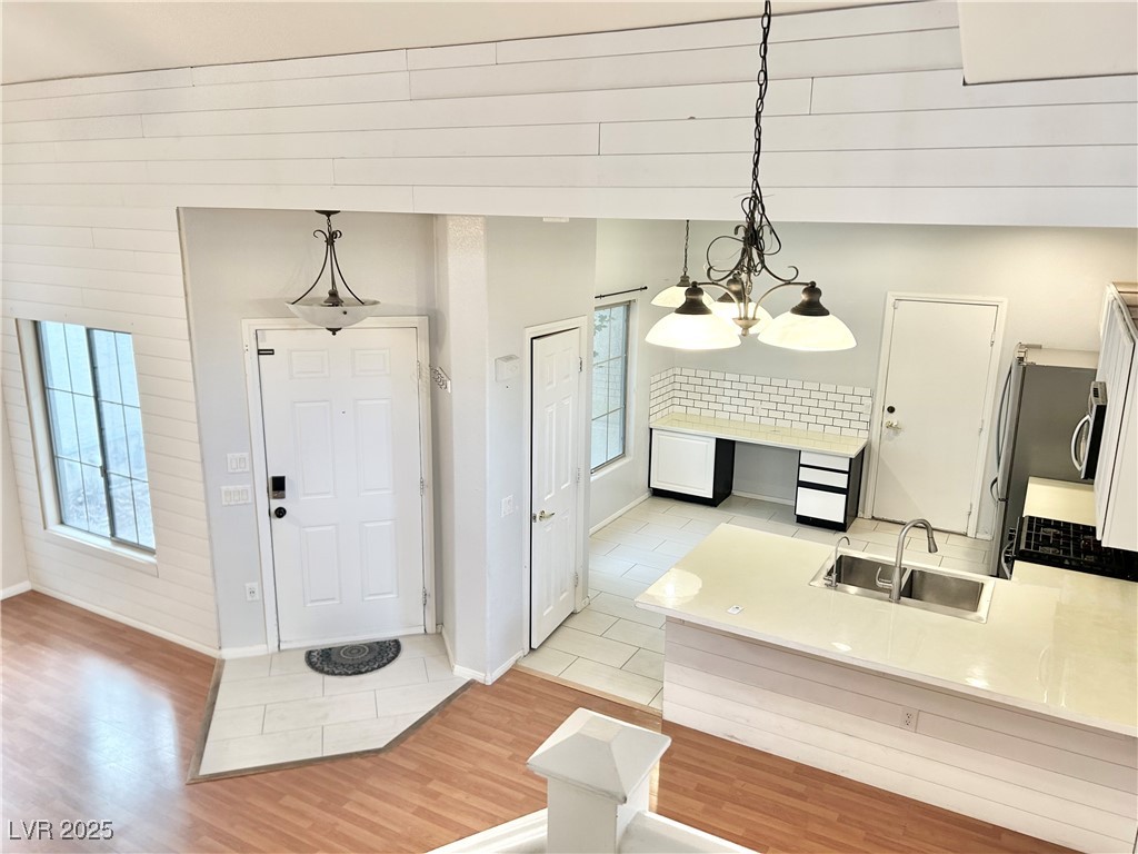 7876 Territorial Street Las Vegas, NV 89149 - Photo 22 of 30 View of kitchen from Stairs