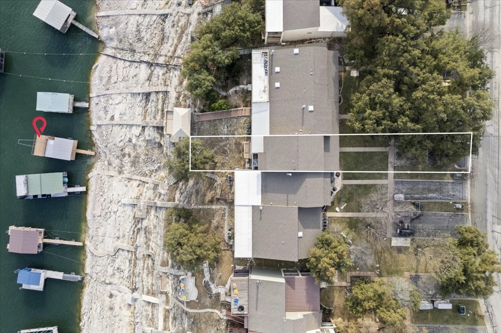 18231 Lakepoint Cove Lago Vista, TX 78645 - Photo 27 of 39 a aerial view of houses and roads