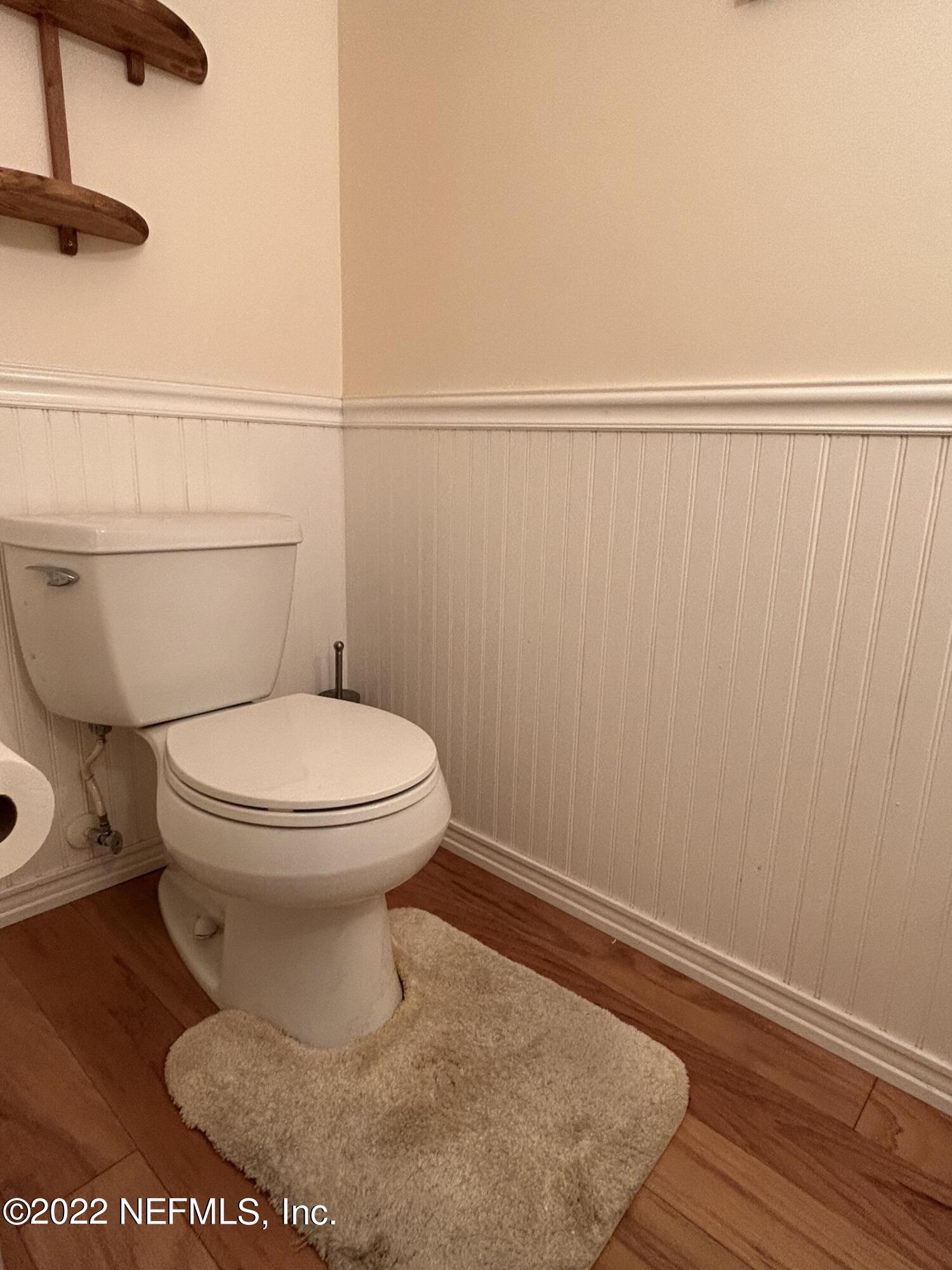 7116 St Augustine Road Jacksonville, FL 32217 - Photo 6 of 26 a bathroom with a toilet and a shower