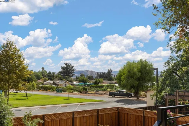 a bathroom with a sink vanity and mirror