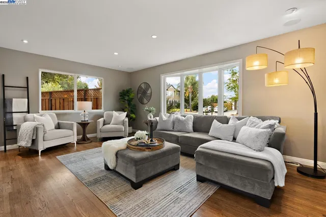 a bedroom with furniture and a fireplace