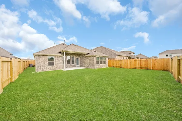 a view of a yard in front of a house
