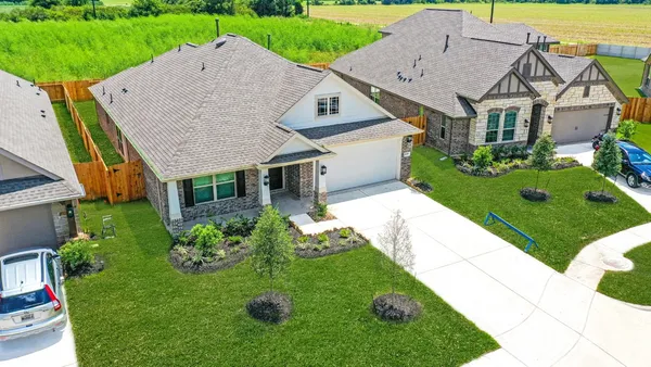 a aerial view of a house with garden