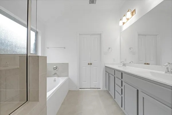 a view of bathroom with dual sinks